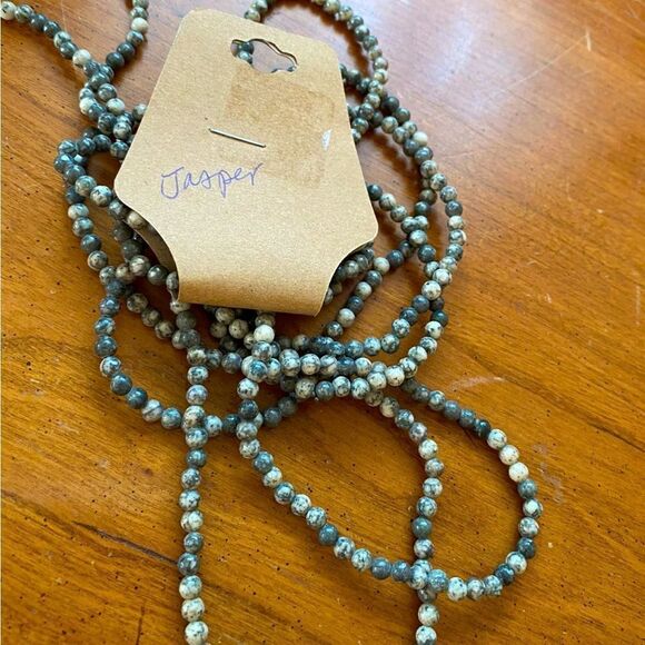 Two 17 inch strands of natural grey jasper beads necklace